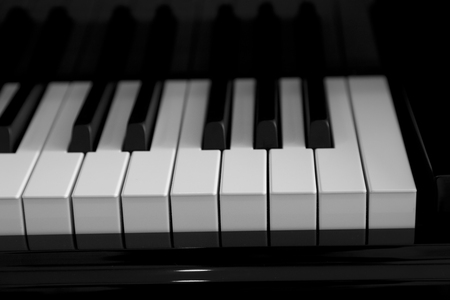 Piano keys close up using warm filter.の写真素材