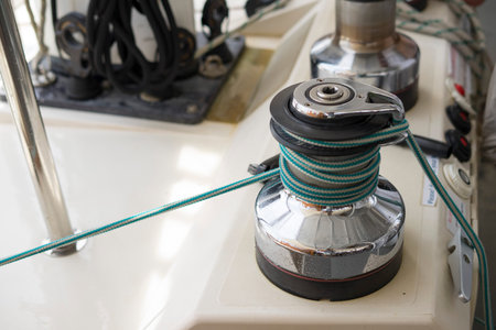 Sailboat winch and rope ,yacht detail. Yachting