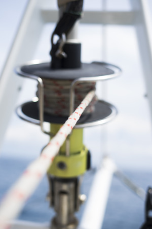 Sailboat winch and rope ,yacht detail. Yachtingの写真素材