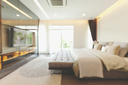 Blurred bedroom with modern house interior. Bokeh backgroundの写真素材
