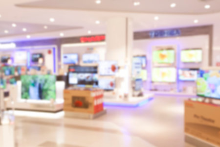 Abstract blur background of home appliance or electronic store or television department section