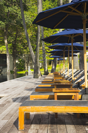 Daybed by the pool with Andaman Sea viewの写真素材