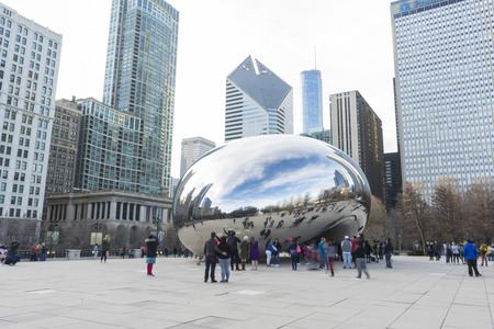 Crowded of people visiting the Cloud Gate sculpture in Millennium Park, Chicago,USAのeditorial素材