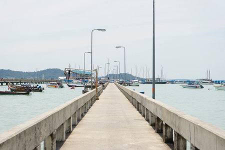 Many luxury yachts moored at Chalong Pier on sunny day in Phuket,Thailand