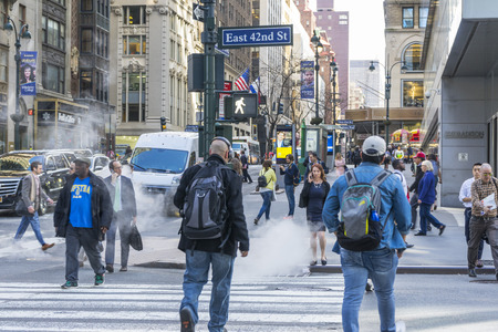 Many people walking on E 42nd St with building in the background in New York City, NYのeditorial素材