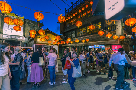 Beautiful Old Town Jiufen with crowd of tourists sightseeing at nighttime in New Taipei City, Taiwanのeditorial素材