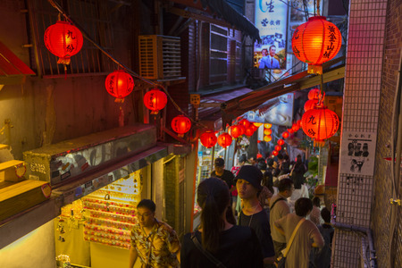 Beautiful Old Town Jiufen with crowd of tourists sightseeing at nighttime in New Taipei City, Taiwanのeditorial素材