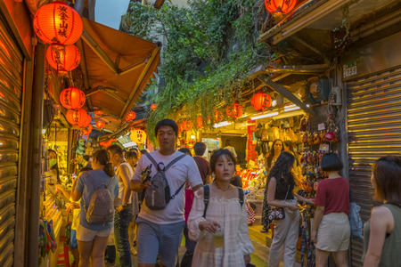Beautiful Old Town Jiufen with crowd of tourists sightseeing at nighttime in New Taipei City, Taiwanのeditorial素材