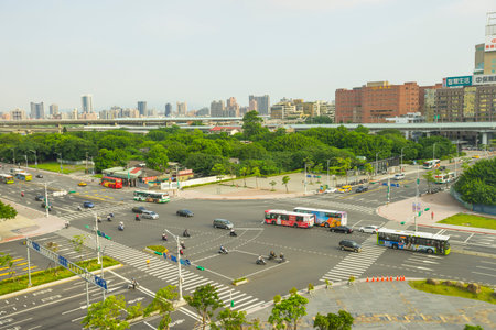 View of a city road intersection in the downtown area near Taipei main station in Taipei, Taiwan