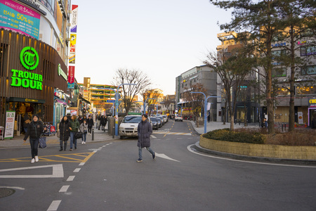 Twilight view of Hongdae(Hongik University) shopping street with unidentified people shopping in Seoul, South Koreaのeditorial素材