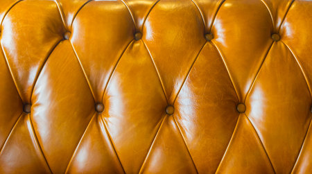 Brown leather sofa texture background.