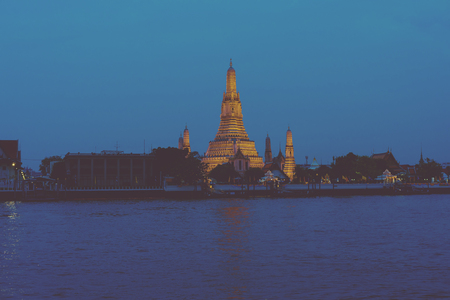 View of Wat Arun temple at sunset in bangkok Thailand.のeditorial素材