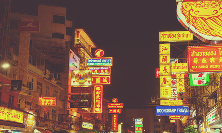 Shop signs and billboards at Yaowarat at nighttime in Bangkok,Thailandのeditorial素材