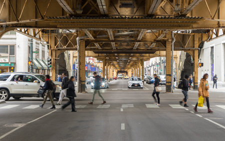 Street view of Chicago downtown under elevated train station in Chicago,USA