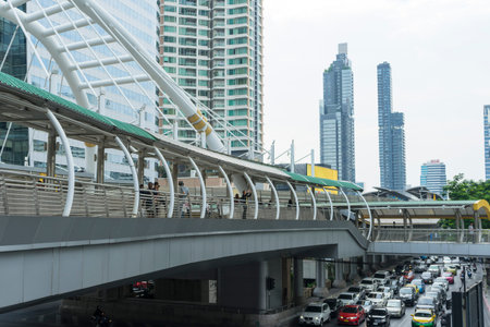 View of public sky walk at Chong Nonsi pedestrian bridge in Bangkok, Thailand