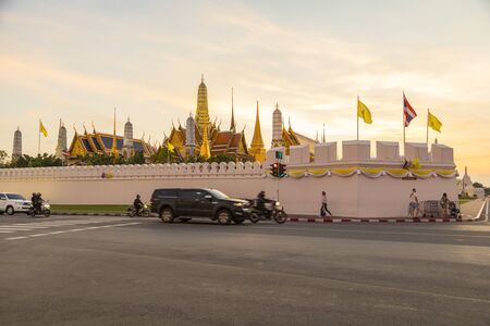 Street traffic in front of Wat Phra Kaew (Temple of Emerald Buddha) and Grand Palace in Bangkok, Thailandのeditorial素材