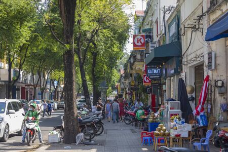 Street view of Ho Chi Minh with unidentified local Vietnamese people commute on the road in Ho Chi Minh City, Vietnamのeditorial素材