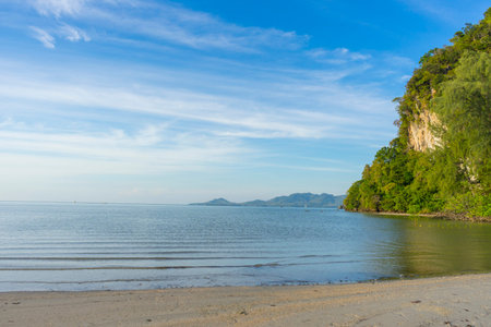 Light blue sky and islands in the background at Hat Chao Mai National Park, Trang, Thailand.