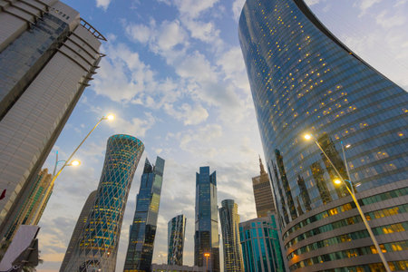 Futuristic modern skyscrapers in financial district at twilight in Doha, Qatar