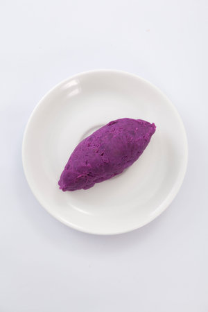 Sweet potatoes isolated on white.
