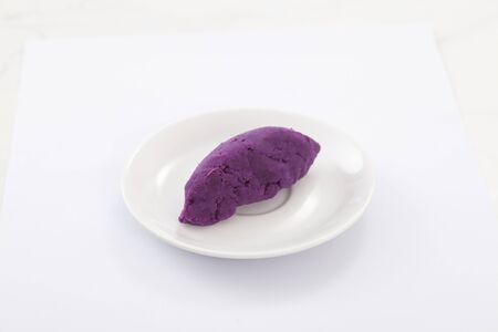 Sweet potatoes or satsumaimo isolated on white.の写真素材