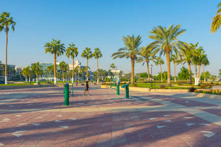Cornish Walk Way Park with blue sky in Doha, Qatarのeditorial素材