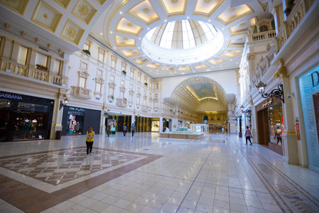 People shopping inside famous Villaggio Mall, a shopping center in Aspire Zone, Doha, Qatar
