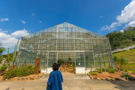 people sightseeing at Queen Sirikit Botanic garden in Chiang Mai, Thailand