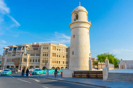 Al Ahmad Mosque, ancient mosque with its minaret in the heart of Souq Waqif, old traditional market in Doha, Qatarのeditorial素材