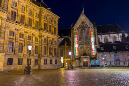 Dam square at night in Amsterdam, Holland.のeditorial素材