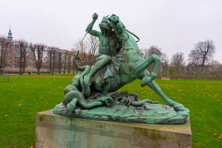 Sculpture Fight with Snake in Rosenborg Castle Gardens or The Kings Garden in Copenhagen.の写真素材