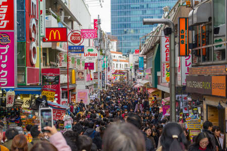 Crowd of people walking and shopping on Takeshita Street in Harajuku in Tokyo, Japanのeditorial素材