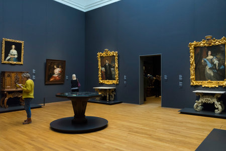 Visitors walking in the gallery of Rijksmuseum in Amsterdam, Netherlands