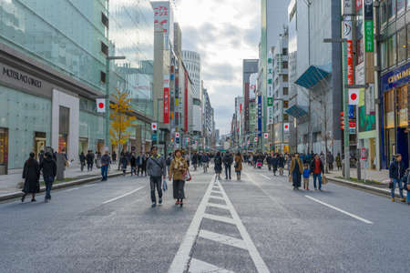 people walking and relaxing on Ginza street in Tokyo, Japanのeditorial素材