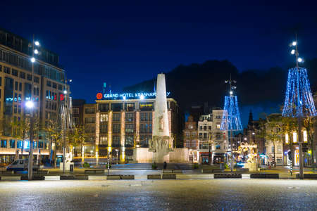 The National Monument on Dam Square at night time in Amsterdam, Netherlandsのeditorial素材