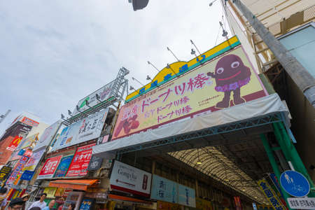 people walking in front of Makishi Public Market at Kokusai Dori Shopping Street in Naha, Okinawa, Japanのeditorial素材