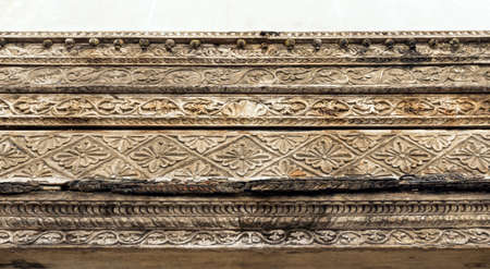 Wood frame and carving floral ornament. Decorative carved on wooden surface.の写真素材