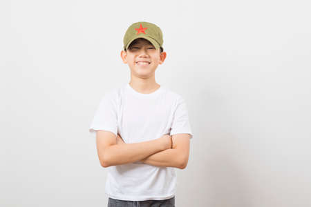 Asian boy wearing an Army Hat on white background.の写真素材