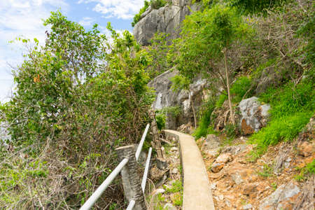 Walking trail across the mountain of the Khao Sam Roi Yot National Park in Thailand.の写真素材