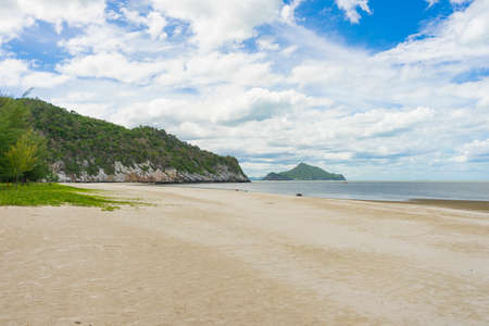 White Sandy Beach of Laem Sala beach which is Flanked On Three Sides By Dry Limestone Hills, Thailand.の写真素材