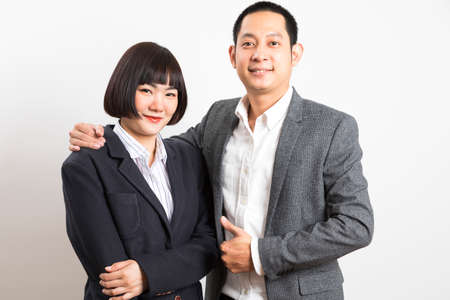 Asians executive businessman and adviser businesswoman standing on white background.の写真素材