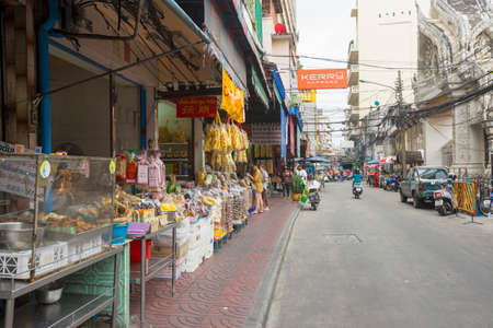 Dried herb and fruit shop with many people in Yaowarat or Chinatown in Bangkok, Thailand.のeditorial素材