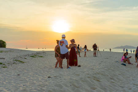 Many tourist come to enjoy the sunset view at North Point Beach in Ko Lipe island in Satun, Thailandのeditorial素材