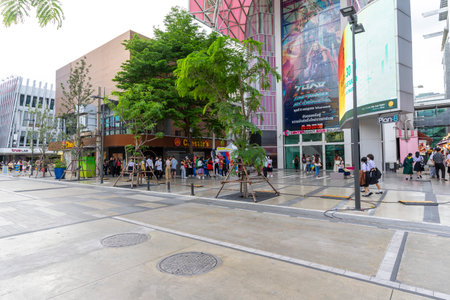 Bangkok,Thailand - July 7,2022 : People cross crosswalk near Digital Gateway at siam square in Bangkok, Thailand.のeditorial素材