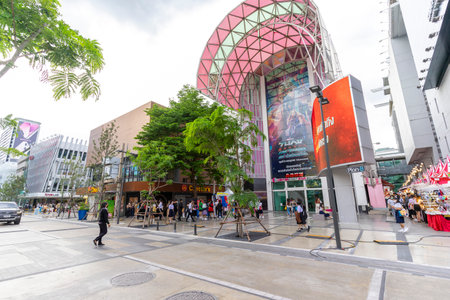 Bangkok,Thailand - July 7,2022 : People cross crosswalk near Digital Gateway at siam square in Bangkok, Thailand.のeditorial素材