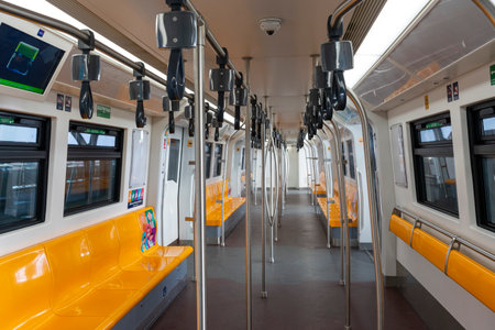 Bangkok,Thailand - Dec 23,2021 : Interior view of BTS green line with passenger in Bangkok,Thailand on Dec 23,2021.のeditorial素材