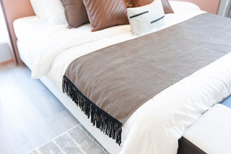 Beautiful luxury Pillow on bed decoration in bedroom interior - Vintage Light Filter