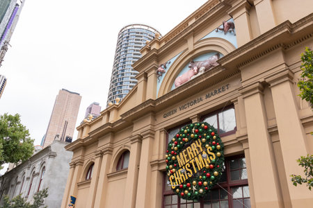 Unidentified people at the entrance of Queen Victoria Market in Melbourne, Australiaの写真素材