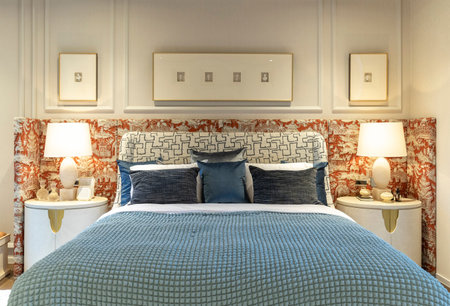 luxury bedroom in classic style with blue bedding and pillows