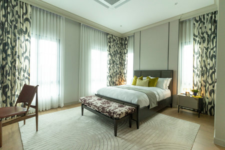 Interior of a hotel bedroom, bedroom with a double bed.の写真素材